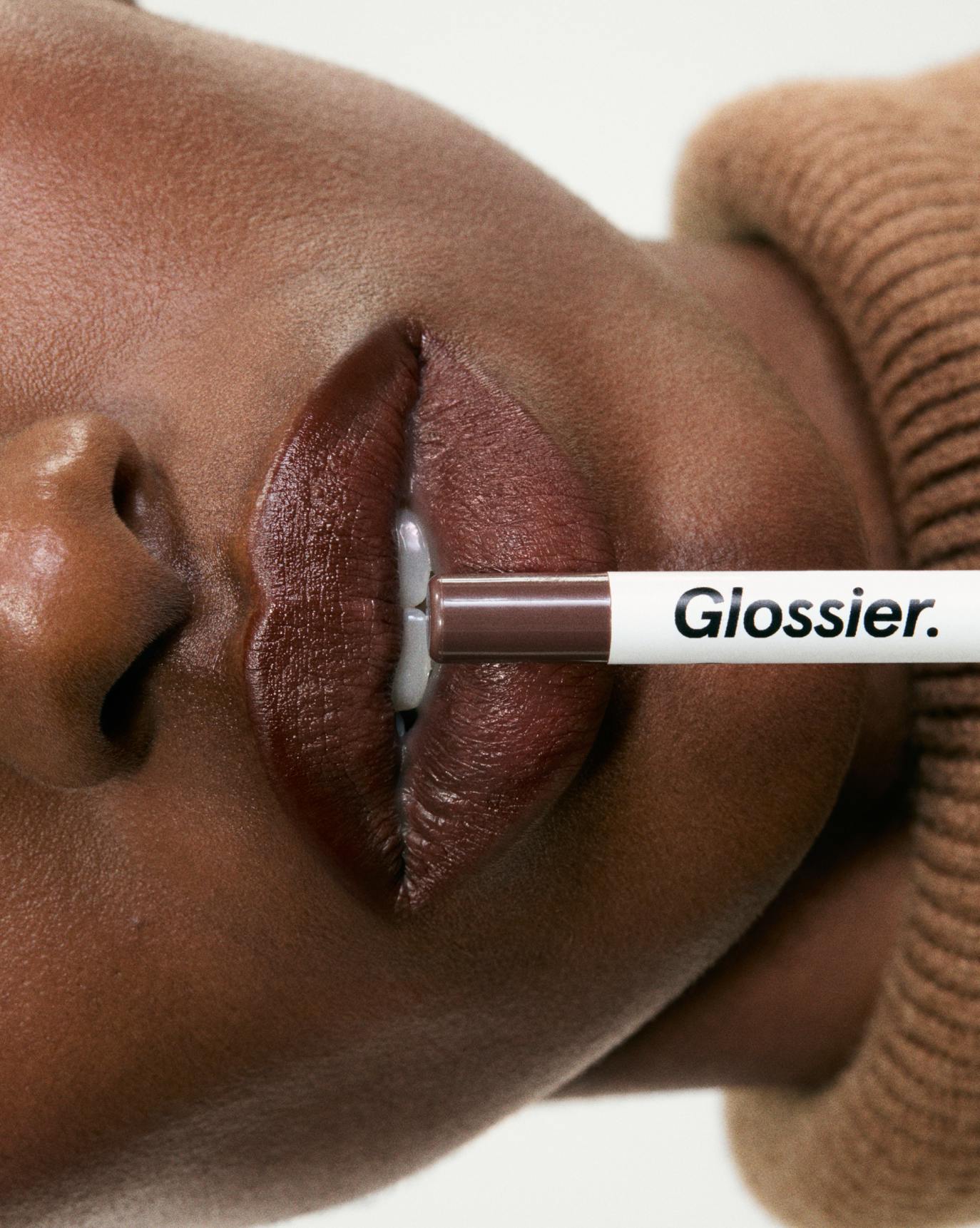 Bibi wears Lip Line in Bare.